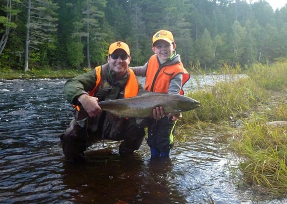 Jeff Morris and son Ben with a very nice salmon caught on the Main Southwest Miramichi