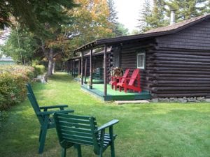 Riverfront log cabins at Pond's Resort on the Miramichi.