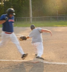 Matthew Hebert of the Miramichi 'Towne Ford' Rangers is out by a step, thanks to the quick glove of Brewers' first baseman Blake Lynch.