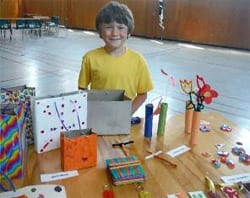 Caden at one of his craft tables during his annual fundraising craft sale.