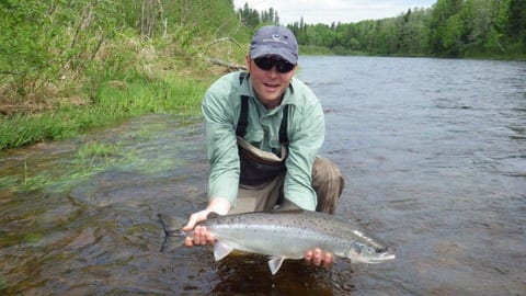 Ledges guest Al Putnam with a feisty June salmon - Guided by Derek Munn