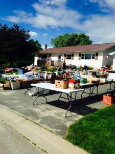 Everyone is busy setting out the amazing amount of items for the yard sale tomorrow, Saturday July 4, 2015!