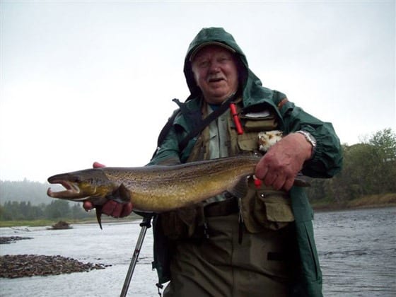 Dave Ingersoll with a male hook-bill caught at Wilson’s Sporting Camps on the Southwest Miramichi on Sunday, September 20, 2015. He also lost another and had one pull his line. Photo by guide Terry Stone.