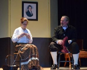  Charlotte Taylor (Cindy Rule) appears unmoved by political arguments of William Davidson (Neil Wallace). Photo by Sydney Clay.
