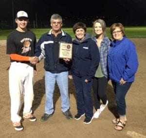 David Brewer, of the Taymouth Tigers, accepts the championship plaque from members of the Blacquier family - Raymond Blacquier, Roxanne Regan, Jenna MacKnight & Sherri Lynn MacKnight