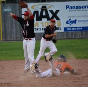 Spencer Stokes #9 steals second base as Tyler McKay leaps for the ball. Backing up the play is Gary Ryder as the Ironmen won 6-1 on Tuesday night. Photo by Brian Richard.